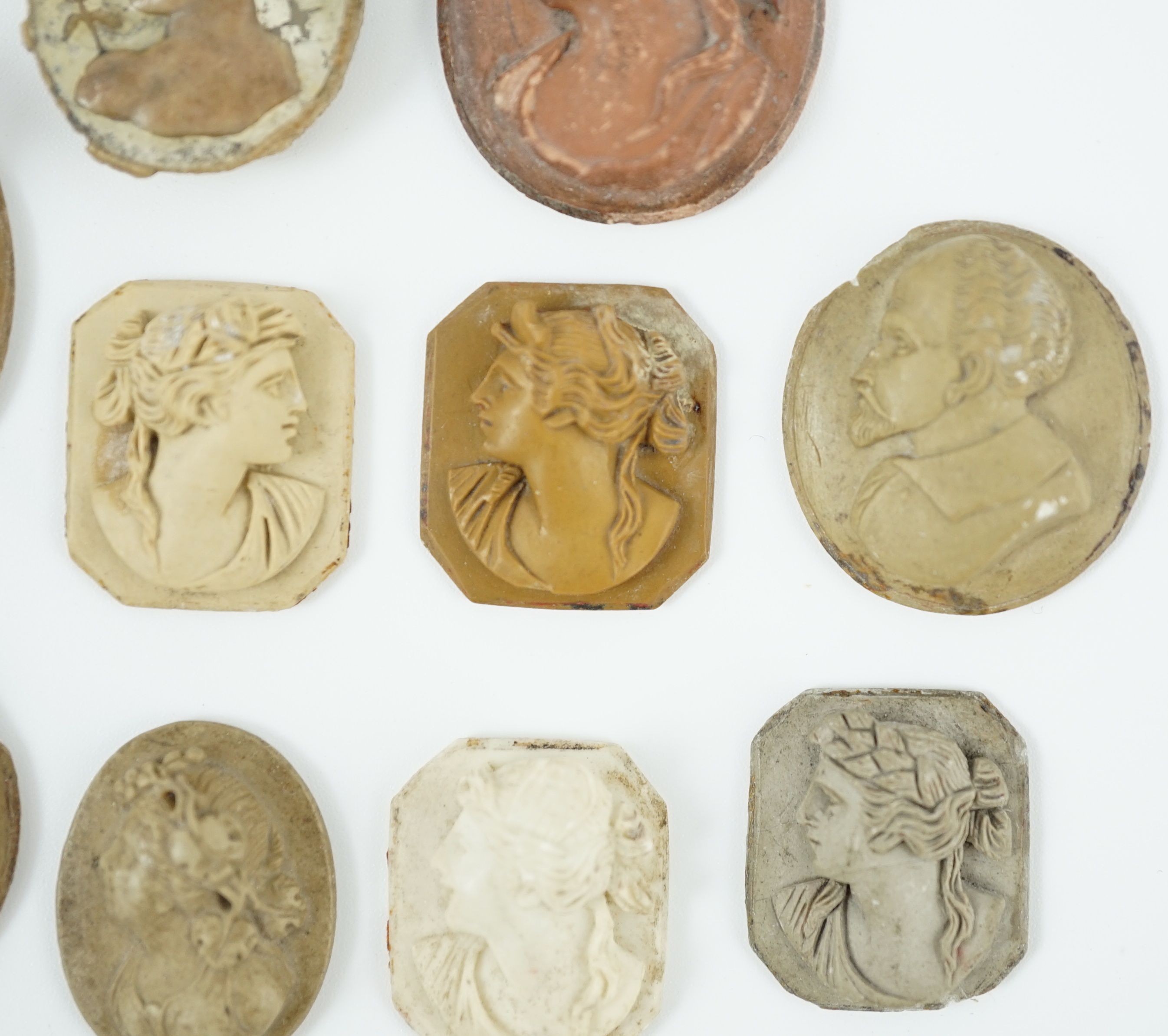 An antique hardstone cameo of Hermes and nine Italian lava cameos largest 2.75 x 2.25cm.